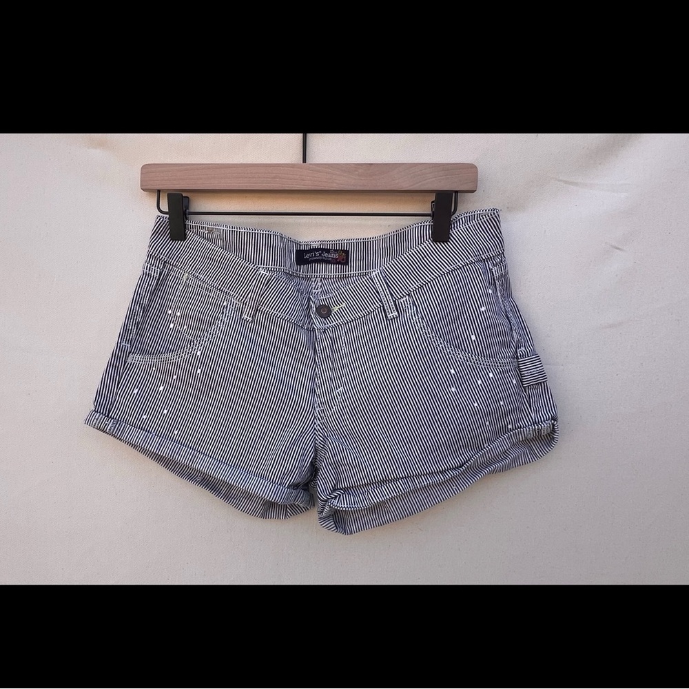 Levi's Shorts
Size 7
Black & White Pinstripe Denim Shorts with Stud Accents